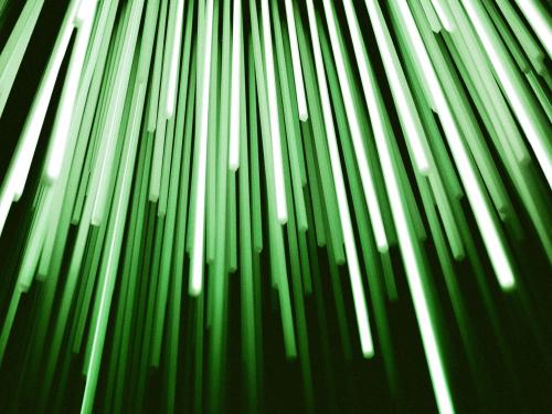 Horizontal photo of green light beams.