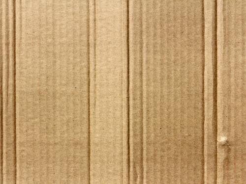 Horizontal photo of a cardboard sheet.