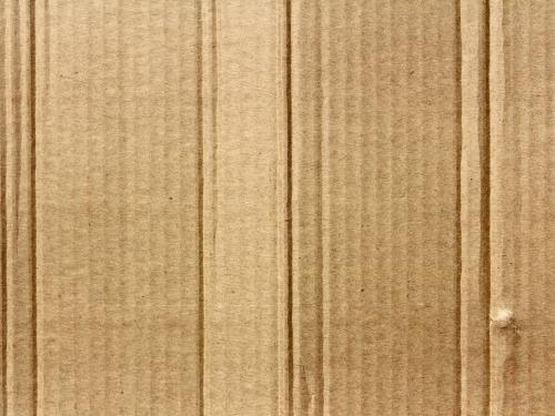 Horizontal photo of a cardboard sheet. 