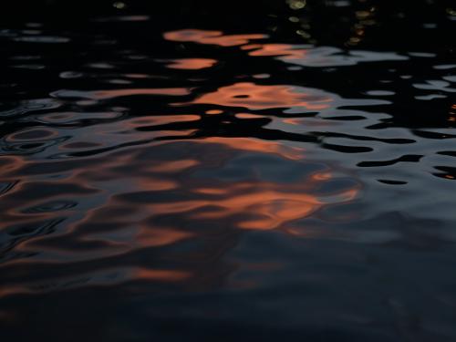 Horizontal photo of rippling water. 