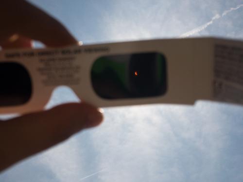 Photo of sun looking through eclipse viewing glasses